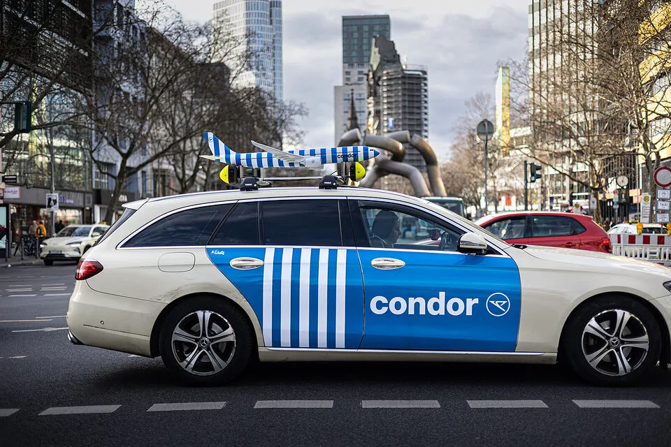 Condor Door Cover taxi advertising on Tauentzienstraße